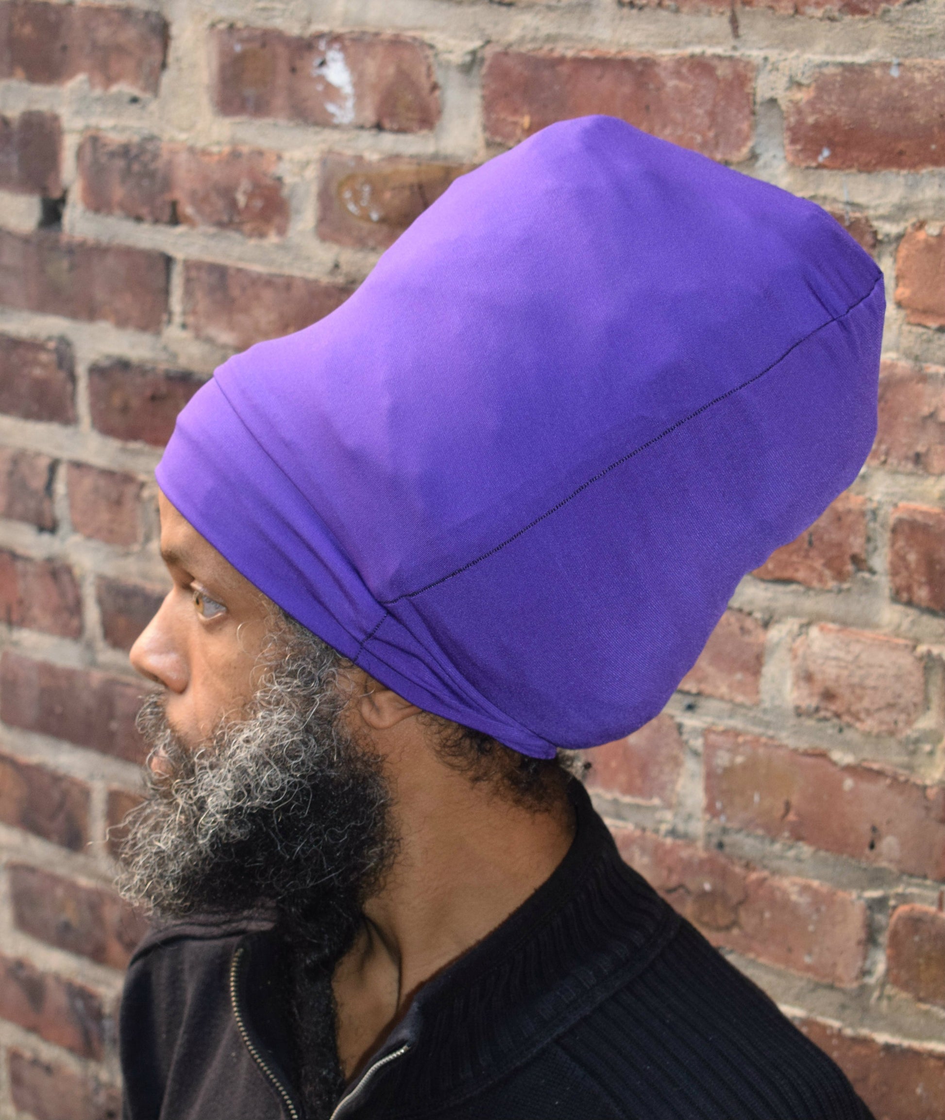 Purple stretch hat - side view.
