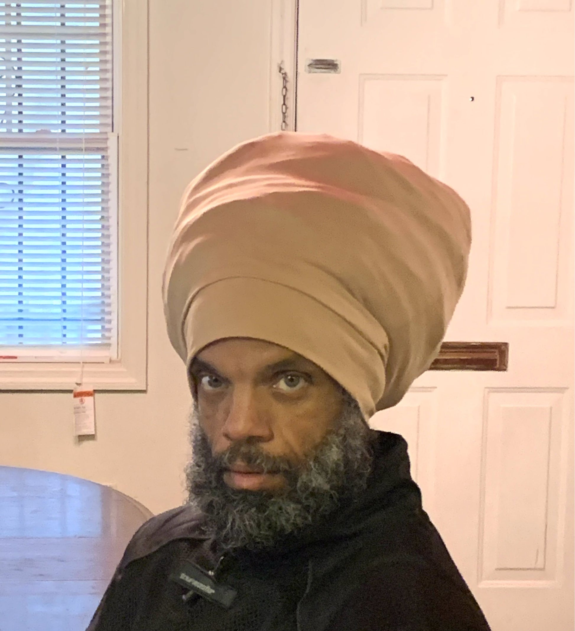 Tan stretch hat - front view.
