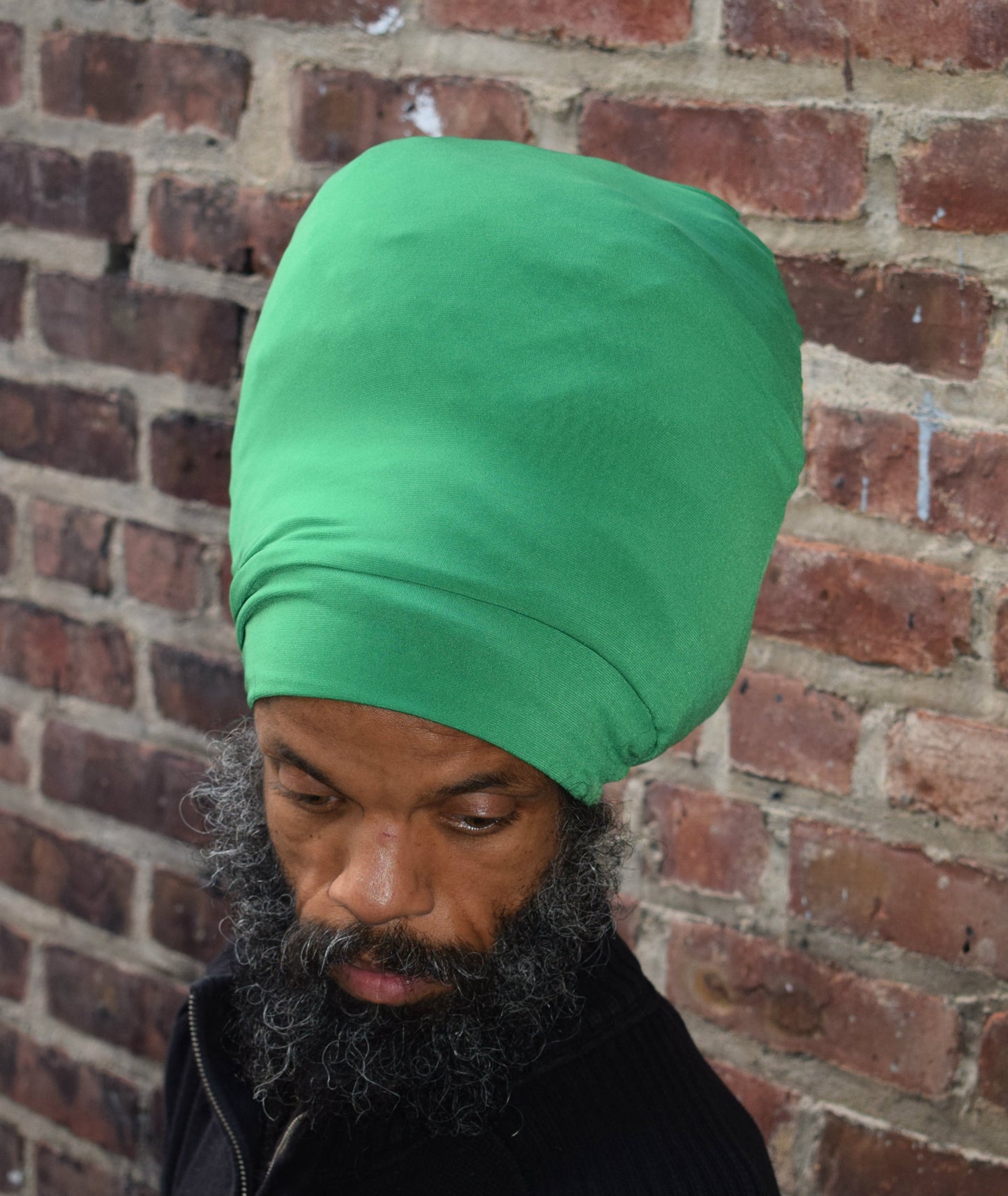 Emerald Green stretch hat - front view.