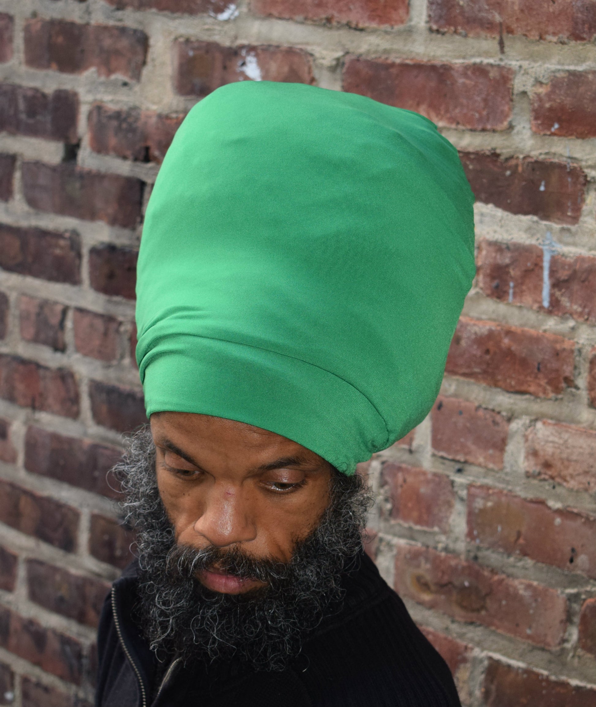Emerald Green stretch hat - front view.