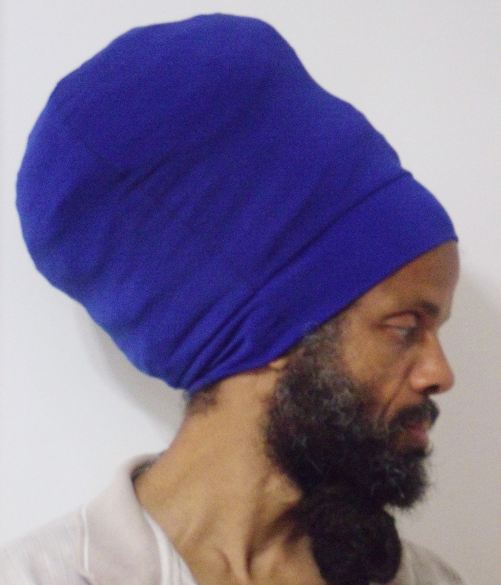 Royal Blue stretch hat - side view.