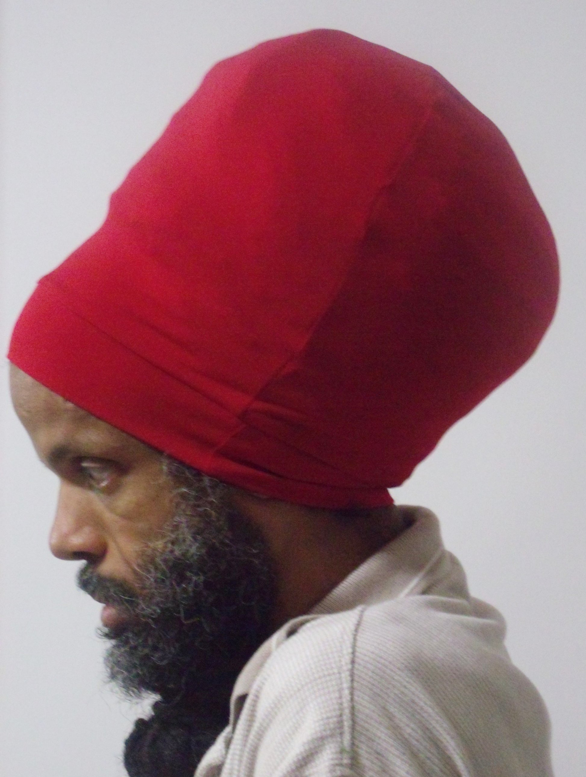 Red stretch hat - side view.
