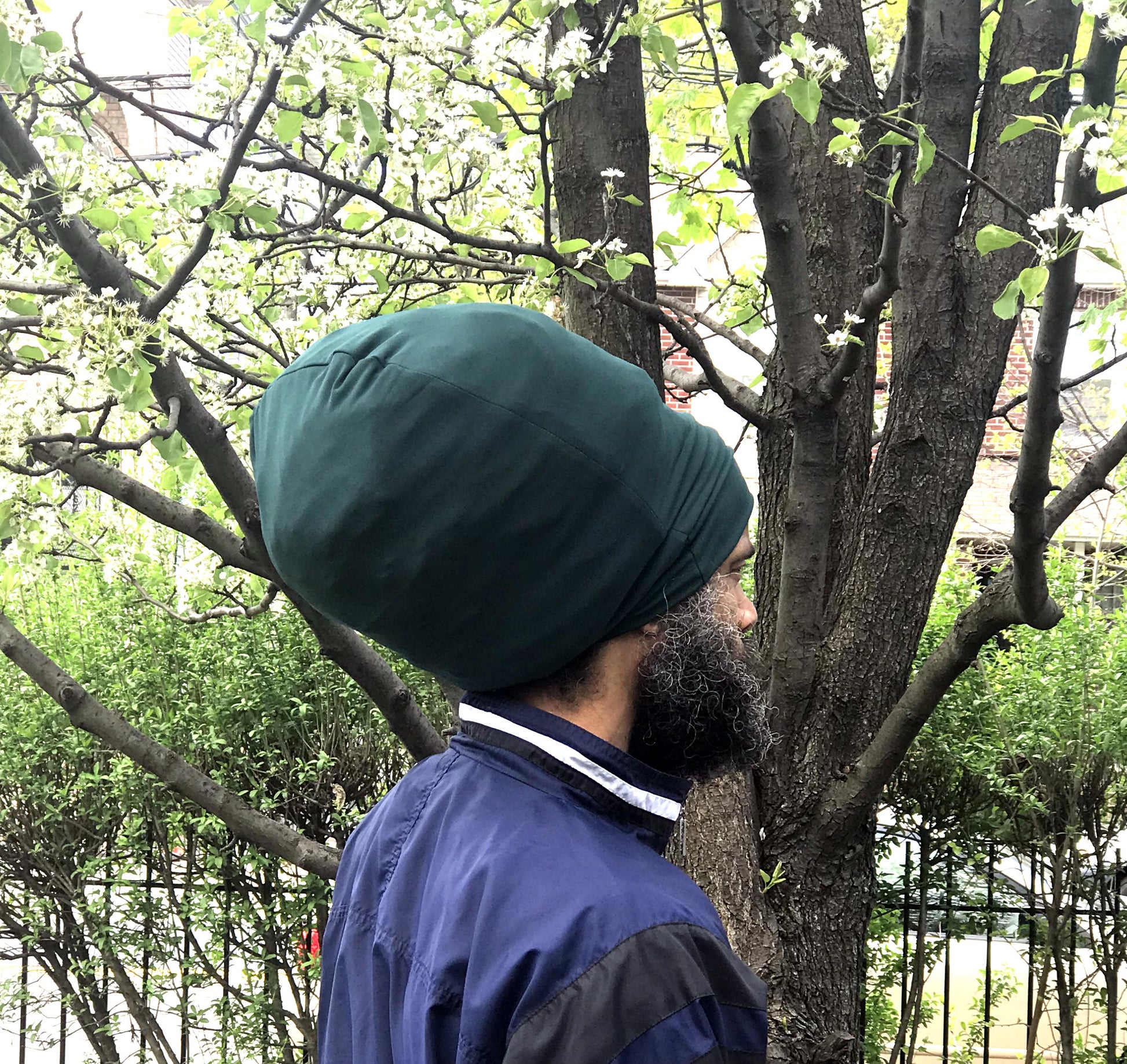 Hunter Green stretch hat - side view.