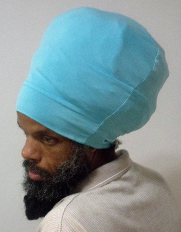 Light Blue stretch hat - side view.