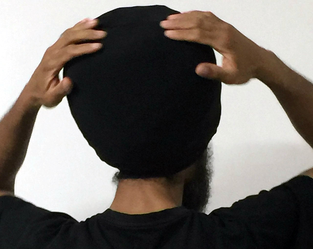 Black hat for dread locs- back view.