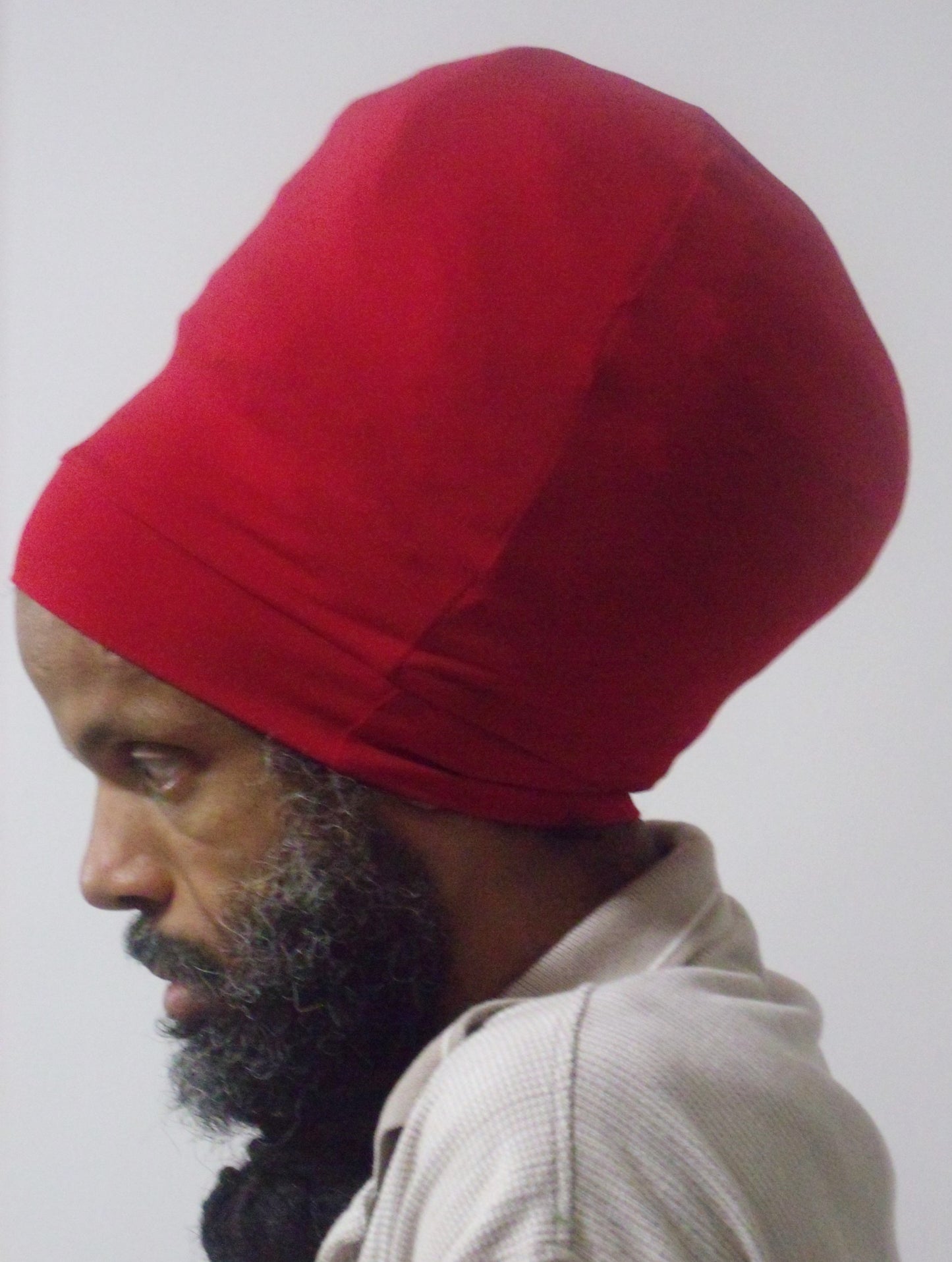Red stretch hat - side view.