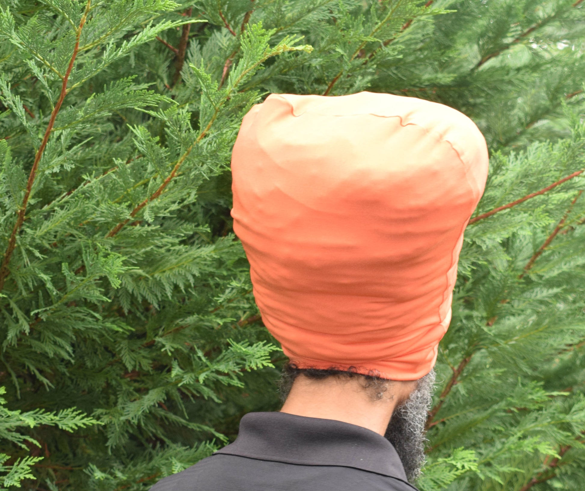 Orange stretch hat - back view.