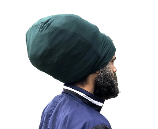 Hunter Green stretch hat - side view. 